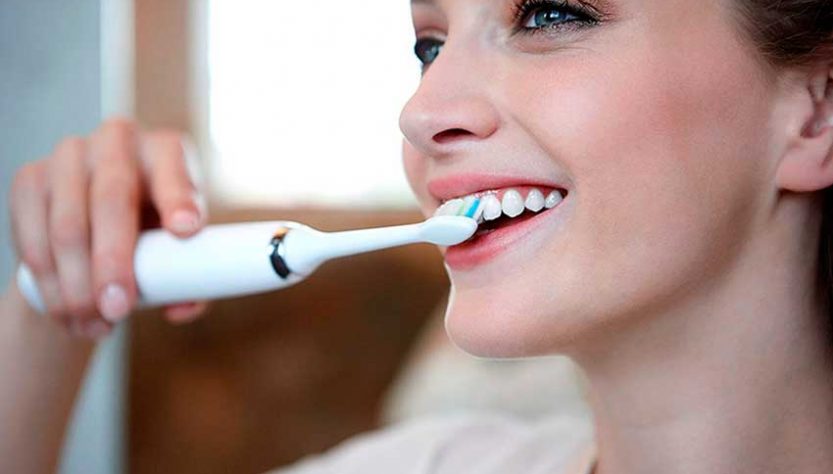 Электро зубная щетка, в чем эффективность использования, какие есть недостатки